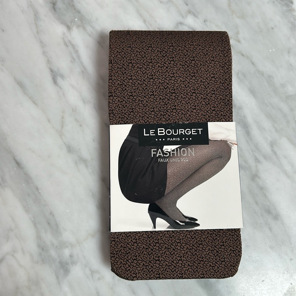 Brand new opaque leopard like tights purchased in Paris, France. NEVER USED.